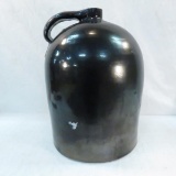 Vintage dark brown glazed stoneware beehive jug