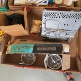 Old radio, speedometer and other car parts