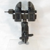 Antique cast iron vise with swivel stand