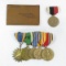 U.S. military metal bar with 5 medals & ID card