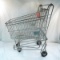 Coca-Cola bottle rack on child's grocery cart