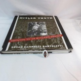 1934 Hitler youth ceramic donation badge with book