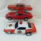 3 vintage tin battery op cars