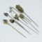 8 antique stick pins- 1 missing stone