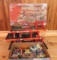 Tri Level tin garage with box and diecast cars