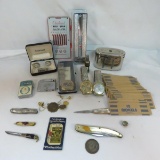 Men's watches, knives, lighter, coin counter