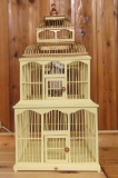 Painted wooden bird cage with feather owl