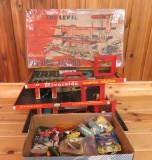 Tri Level tin garage with box and diecast cars