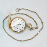 Elgin pocket watch in 20 yr hunter case with chain