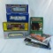 4 O gauge train cars in boxes & 5 train books