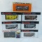 7 Lionel O gauge train cars with boxes