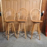 3 tall wooden swivel seat bar stools