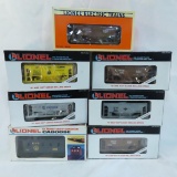 7 Lionel O gauge train cars with boxes