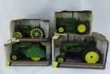 4 Ertl John Deere tractors w/boxes 1935 model BR