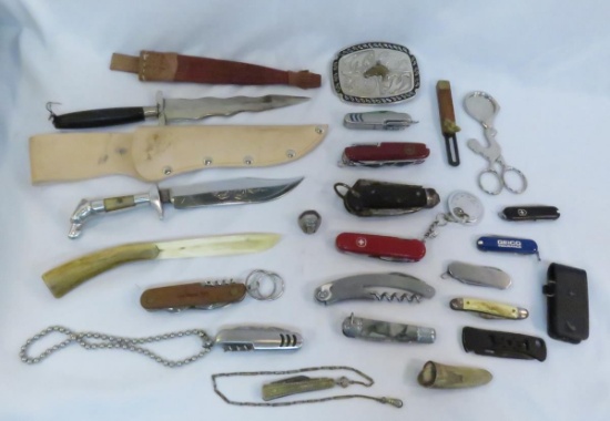 Knives, belt buckle, bear tooth and more