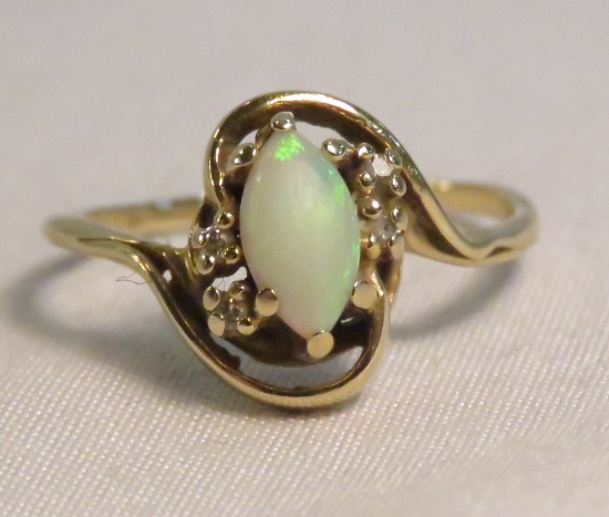 10kt Magic Glo gold ring with opal and diamonds