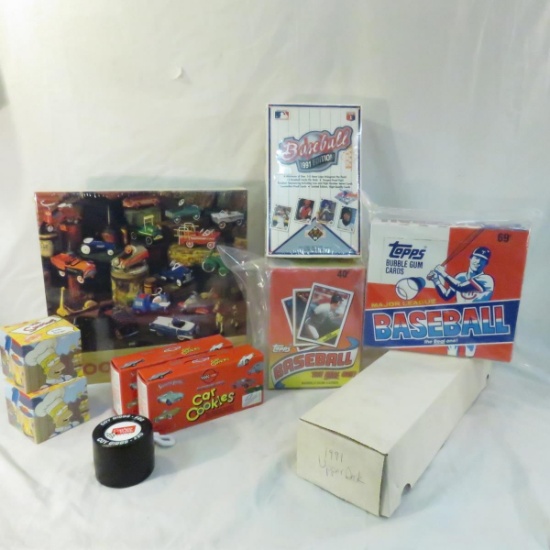 Baseball cards, puzzle, Simpson watches
