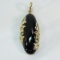 14kt gold & onyx enhancer pendant 14.19gtw