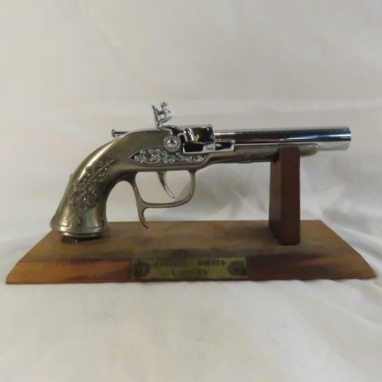 Antique pistol lighter with stand