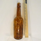 Louis Taussig & Co Bottle with Union Mark 1903-18