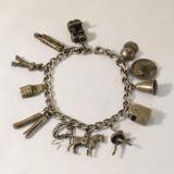 Vintage silver charm bracelet- some sterling