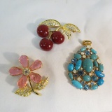 2 Joan Rivers brooches and 1 pendant