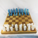 Wood chess board with marble pieces