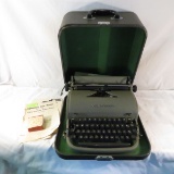Vintage Remington Rand typewriter in case