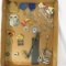 Antique eyeglasses, school pins, letter opener