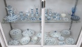 Large collection of blue and white dishware