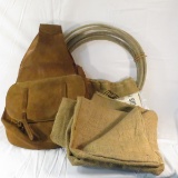 Vintage leather saddlebags, rope, burlap sack