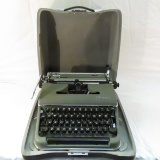 Vintage Olympia typewriter in case