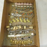 Vintage costume jewelry and charm bracelets