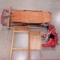 Glass washing board, sled and red ice skates