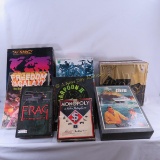 8 Boxed games, some for parts