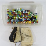 Vintage & Modern Marbles, shooters, leather bag