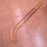 2 Autographed Hockey Sticks- North Stars 1974-75