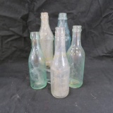 5 antique soda pop and beer bottles