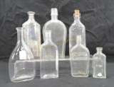 7 antique bottles St Joseph's assures purity