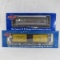2 Atlas O gauge train cars with boxes