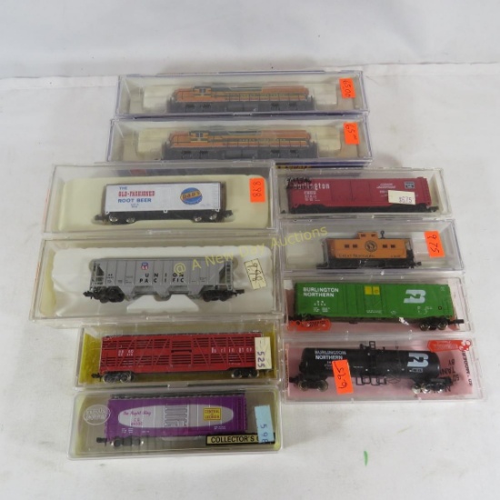 10 N Scale Train Cars with 2 Locomotives