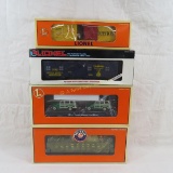 4 Lionel Cars with boxes- Gondola, Flat & box cars