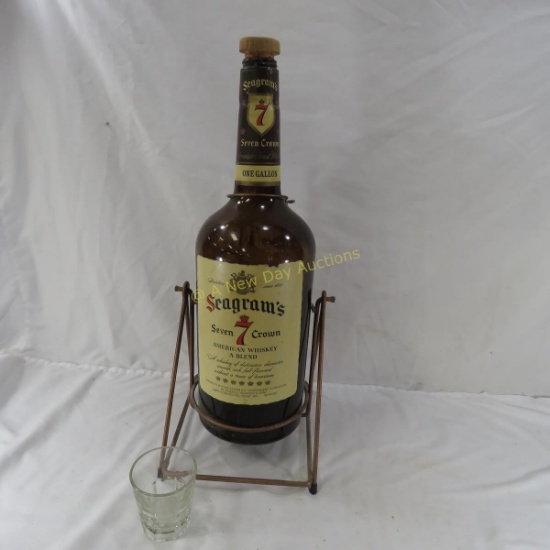Large Seagram's bottle on pour stand & 1 glass