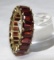 14kt yellow gold and garnet eternity ring
