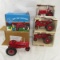 4 Ertl Farmall tractors in boxes