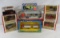 Matchbox and Ertl diecast vehicles in boxes