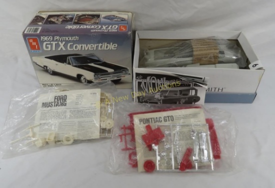 Model kits in boxes and bags