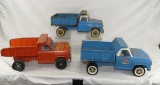 3 vintage Tonka dump trucks