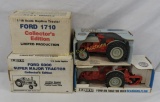 4 Ertl Ford tractors in original boxes