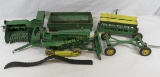 Vintage John Deere toy tractor and implements